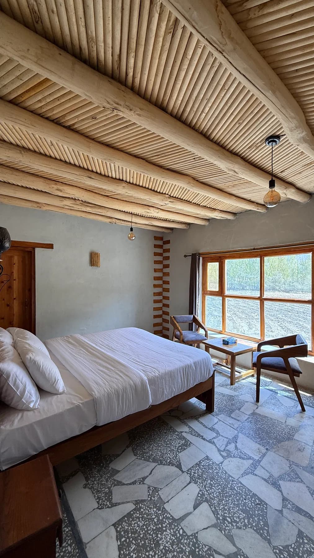 Morning light on a simple wooden bed